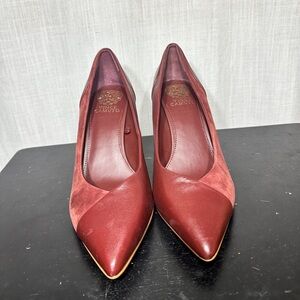 Vince Camuto pointed-toe pumps in burgundy suede and leather.